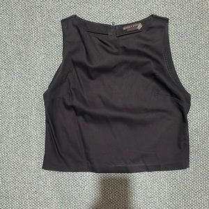 Alice & Olivia black tank top, not totally a crop top but a little shorter